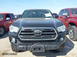 2019 Toyota Tacoma 4WD SR with VIN 5TFCZ5ANXKX166417, listed as a IAAI auction lot 41679237 with 67,055 mi miles. Bid and sale history available at carsss.com. Image 12.