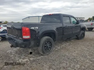 2012 GMC Sierra 2500HD SLT with VIN 1GT121E89CF142433, listed as a Copart auction lot 71720594 with 171,967 mi miles and Salvage title. Bid and sale history available at DreamBid. Image 3.