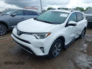 2016 Toyota RAV4 XLE with VIN 2T3RFREV8GW450273, listed as a IAAI auction lot 42281091 with 75,478 mi miles and . Bid and sale history available at DreamBid. Image 2.