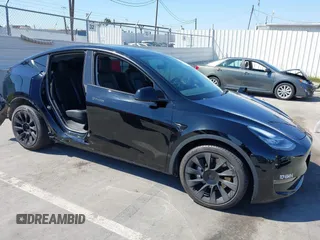 2022 Tesla Model Y Long Range with VIN 7SAYGDEE6NF480471, listed as a IAAI auction lot 41985797 with 82,777 mi miles and . Bid and sale history available at DreamBid. Image 1.