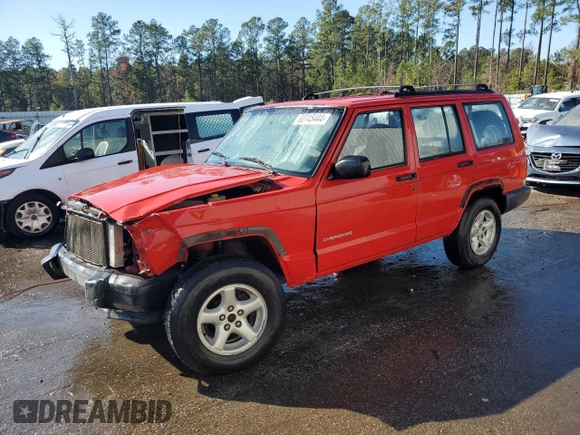 1999 Jeep Cherokee SE with VIN 1J4FT28S6XL515896, listed as a Copart auction lot 83745444 with 192,406 mi miles and Salvage title. Bid and sale history available at DreamBid. Image 1.