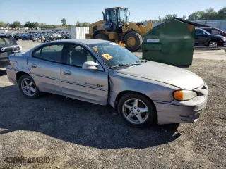2000 Pontiac Grand Am GT with VIN 1G2NW52E3YM812928, listed as a Copart auction lot 74597974 with 0 mi miles and Non Repairable. Bid and sale history available at carsss.com. Image 4.