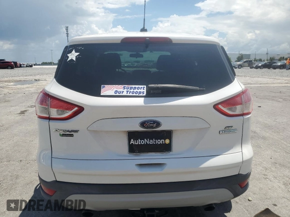 2013 Ford Escape SE z VIN 1FMCU0GX6DUD64499, wystawiony jako Copart lot #60971245 z przebiegiem 63 411 mil mil oraz Szkoda całkowita • Salvage title. Historia ofert i sprzedaży dostępna na DreamBid. Obrazek 6.