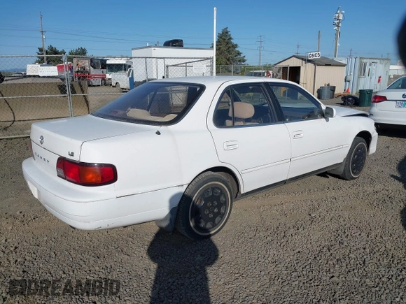 1995 Toyota Camry LE z VIN JT2SK12E5S0332027, wystawiony jako IAAI lot #42078977 z przebiegiem 128 929 mil mil oraz . Historia ofert i sprzedaży dostępna na DreamBid. Obrazek 4.