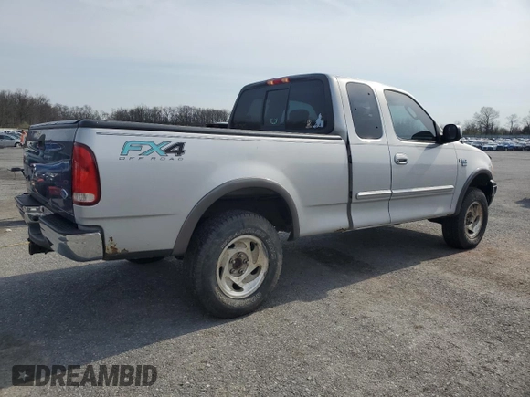 2003 Ford F-150 XL with VIN 1FTRX18L23NA66919, listed as a Copart auction lot 52911285 with 153,870 mi miles and Salvage Title. Bid and sale history available at carsss.com. Image 3.