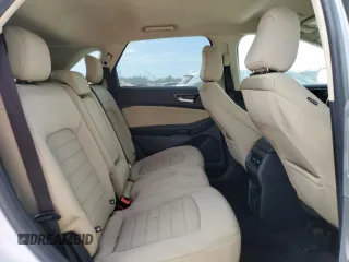 2020 Ford Edge SE z VIN 2FMPK3G98LBB42724, wystawiony jako Copart lot #49602455 z przebiegiem Nie podano mil oraz Nie do naprawy • Non repairable. Historia ofert i sprzedaży dostępna na DreamBid. Obrazek 11.