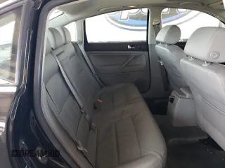 2003 Volkswagen Passat GLS z VIN WVWPD63BX3P200060, wystawiony jako Copart lot #60908225 z przebiegiem 112 950 mil mil oraz Czysty tytuł • Clean title. Historia ofert i sprzedaży dostępna na DreamBid. Obrazek 10.