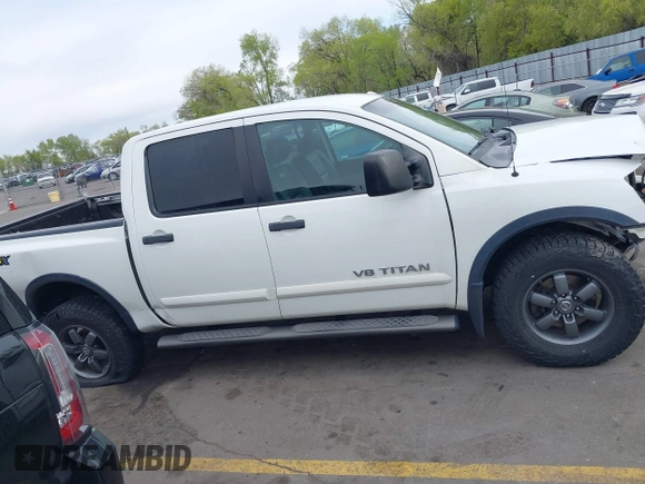 2014 Nissan Titan Pro-4X with VIN 1N6BA0ECXEN501915, listed as a IAAI auction lot 42097967 with 120,851 mi miles and . Bid and sale history available at DreamBid. Image 13.