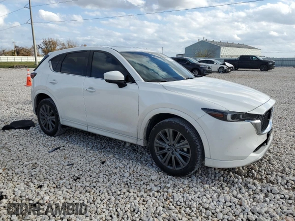2024 Mazda CX-5 2.5 Turbo Signature with VIN JM3KFBXY7R0518304, listed as a Copart auction lot 42788985 with 8,593 mi miles and Salvage Title. Bid and sale history available at carsss.com. Image 4.