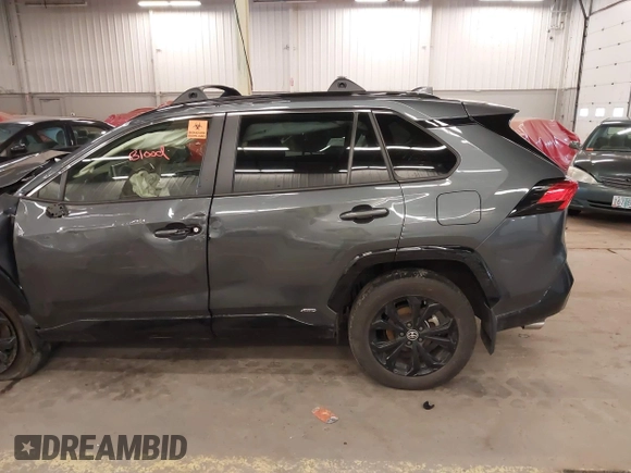2023 Toyota RAV4 Hybrid SE with VIN JTM16RFV9PD089029, listed as a IAAI auction lot 41895409 with Not provided miles and . Bid and sale history available at DreamBid. Image 6.
