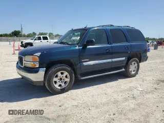 2005 GMC Yukon SLT with VIN 1GKEK13T15J239462, listed as a Copart auction lot 52131435 with 164,696 mi miles and Salvage Title. Bid and sale history available at carsss.com. Image 1.