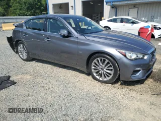 2018 Infiniti Q50 Luxe with VIN JN1EV7AR8JM443555, listed as a Copart auction lot 59691455 with 65,615 mi miles and Salvage title. Bid and sale history available at DreamBid. Image 4.
