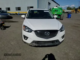 2014 Mazda CX-5 Grand Touring with VIN JM3KE4DY2E0354795, listed as a Copart auction lot 54205775 with 62,939 mi miles and Salvage Title. Bid and sale history available at DreamBid. Image 14.