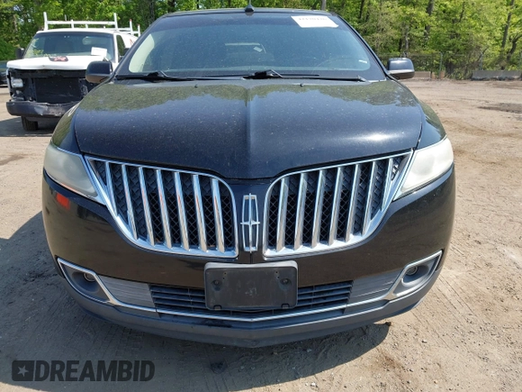 2011 Lincoln MKX with VIN 2LMDJ8JKXBBJ31273, listed as a IAAI auction lot 42170426 with 127,880 mi miles. Bid and sale history available at carsss.com. Image 6.