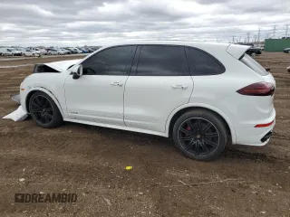 2016 Porsche Cayenne GTS with VIN WP1AD2A27GLA76553, listed as a Copart auction lot 53569615 with 69,761 mi miles and Salvage title. Bid and sale history available at DreamBid. Image 2.