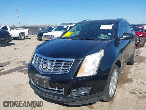 2014 Cadillac SRX Performance Collection z VIN 3GYFNCE35ES517868, wystawiony jako IAAI lot #41775522 z przebiegiem 166 960 mil mil oraz . Historia ofert i sprzedaży dostępna na DreamBid. Obrazek 17.