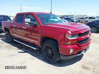 2017 Chevrolet Silverado 1500 LT with VIN 3GCUKREC4HG164281, listed as a IAAI auction lot 42037712 with 133,935 mi miles and . Bid and sale history available at DreamBid. Image 1.