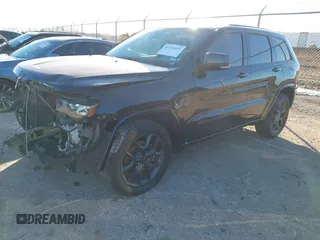 2021 Jeep Grand Cherokee 80th Anniversary with VIN 1C4RJFBG9MC527654, listed as a IAAI auction lot 41212055 with 92,436 mi miles and . Bid and sale history available at DreamBid. Image 2.
