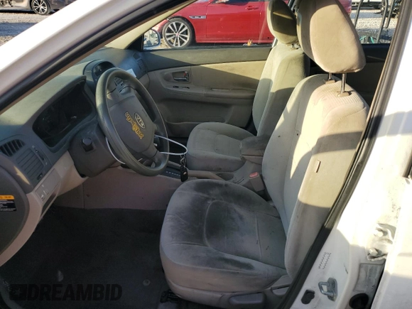 2009 Kia Spectra EX with VIN KNAFE221195630944, listed as a Copart auction lot 42291345 with 83,269 mi miles and Salvage Title. Bid and sale history available at DreamBid. Image 7.