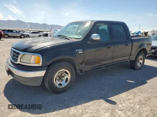 2001 Ford F-150 XLT z VIN 1FTRW07W41KE63376, wystawiony jako Copart lot #66330435 z przebiegiem Nie podano mil oraz Czysty tytuł • Clean title. Historia ofert i sprzedaży dostępna na DreamBid. Obrazek 1.
