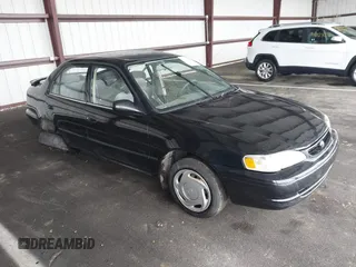 2000 Toyota Corolla VE with VIN 2T1BR12E4YC382631, listed as a IAAI auction lot 42124500 with Not provided miles and . Bid and sale history available at DreamBid. Image 1.