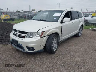 2013 Dodge Journey R/T with VIN 3C4PDCEG5DT642751, listed as a IAAI auction lot 42306951 with 129,338 mi miles and . Bid and sale history available at DreamBid. Image 2.