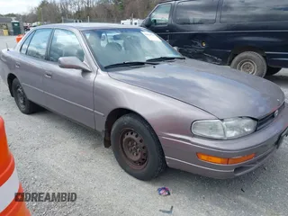 1994 Toyota Camry LE z VIN 4T1SK12E0RU463582, wystawiony jako IAAI lot #41823733 z przebiegiem 120 050 mil mil oraz . Historia ofert i sprzedaży dostępna na DreamBid. Obrazek 1.