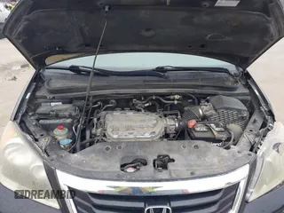 2010 Honda Odyssey EX-L with VIN 5FNRL3H73AB078714, listed as a IAAI auction lot 41520151 with 218,466 mi miles and . Bid and sale history available at DreamBid. Image 10.