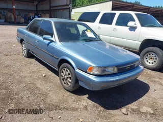 1989 Toyota Camry LE ECT z VIN JT2SV22E9K3334438, wystawiony jako IAAI lot #42262481 z przebiegiem 186 127 mil mil oraz . Historia ofert i sprzedaży dostępna na DreamBid. Obrazek 1.