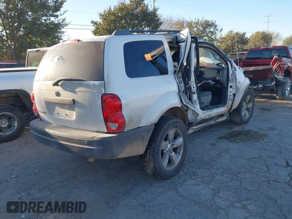 2005 Dodge Durango SXT with VIN 1D4HD38K25F604400, listed as a IAAI auction lot 41409928 with 158,363 mi miles and . Bid and sale history available at DreamBid. Image 4.