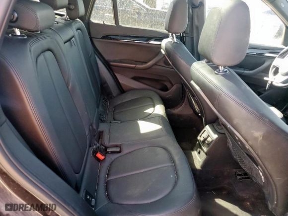 2018 BMW X1 sDrive28i with VIN WBXHU7C31J5H39068, listed as a Copart auction lot 49018985 with 100,611 mi miles and Salvage Title. Bid and sale history available at carsss.com. Image 12.