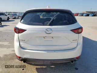 2020 Mazda CX-5 Grand Touring with VIN JM3KFADM7L0804219, listed as a Copart auction lot 51982225 with 56,356 mi miles and Salvage Title. Bid and sale history available at carsss.com. Image 6.