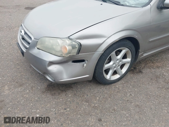 2003 Nissan Maxima SE with VIN JN1DA31DX3T521797, listed as a IAAI auction lot 42737605 with 150,045 mi miles and . Bid and sale history available at DreamBid. Image 6.