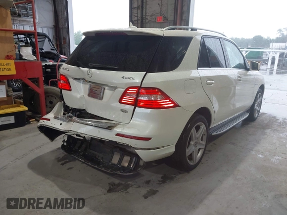 2013 Mercedes-Benz M 550 with VIN 4JGDA7DB3DA165765, listed as a IAAI auction lot 42323988 with 96,344 mi miles and . Bid and sale history available at DreamBid. Image 4.