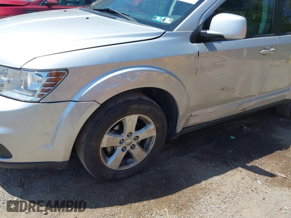 2011 Dodge Journey Mainstreet with VIN 3D4PH1FG4BT562414, listed as a IAAI auction lot 42122747 with 132,488 mi miles and . Bid and sale history available at DreamBid. Image 6.