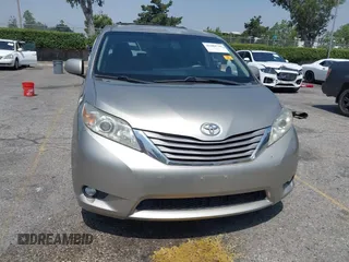 2015 Toyota Sienna XLE with VIN 5TDYK3DC4FS560743, listed as a IAAI auction lot 42488745 with 145,009 mi miles and . Bid and sale history available at DreamBid. Image 12.