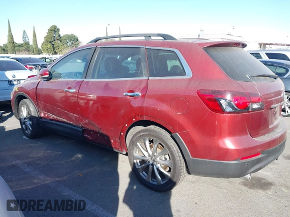 2014 Mazda CX-9 Grand Touring with VIN JM3TB3DV6E0435389, listed as a IAAI auction lot 41406200 with 181,598 mi miles and . Bid and sale history available at DreamBid. Image 14.