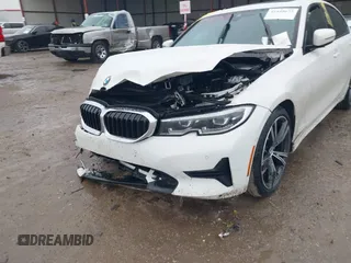 2022 BMW 3 Series 330i with VIN 3MW5R1J01N8C59980, listed as a IAAI auction lot 41445673 with 33,117 mi miles. Bid and sale history available at carsss.com. Image 6.