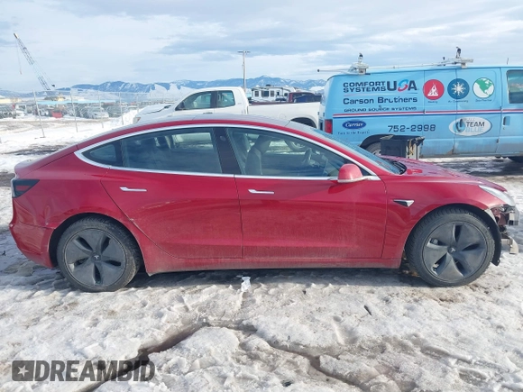 2018 Tesla Model 3 Long Range Battery with VIN 5YJ3E1EB0JF064041, listed as a IAAI auction lot 41562239 with 54,720 mi miles and . Bid and sale history available at DreamBid. Image 14.