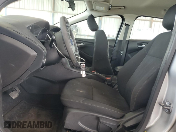 2018 Ford Focus SE z VIN 1FADP3F25JL265168, wystawiony jako Copart lot #56541895 z przebiegiem Nie podano mil oraz Szkoda całkowita • Salvage title. Historia ofert i sprzedaży dostępna na DreamBid. Obrazek 7.