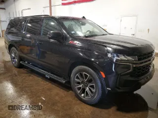 2022 Chevrolet Suburban Z71 with VIN 1GNSKDKDXNR198199, listed as a Copart auction lot 65367055 with 115,505 mi miles and Clean title. Bid and sale history available at DreamBid. Image 4.