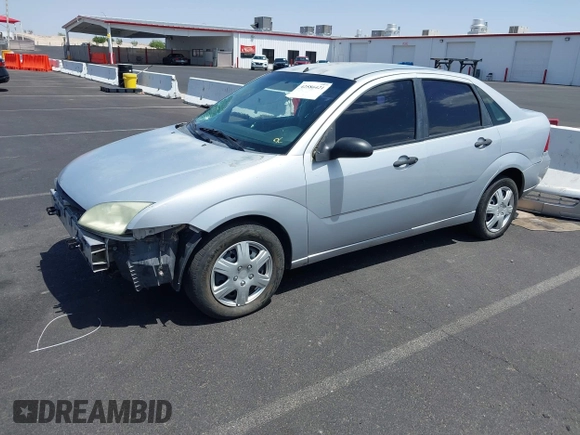 2007 Ford Focus S z VIN 1FAHP34NX7W163158, wystawiony jako IAAI lot #42586421 z przebiegiem 123 131 mil mil oraz . Historia ofert i sprzedaży dostępna na DreamBid. Obrazek 2.
