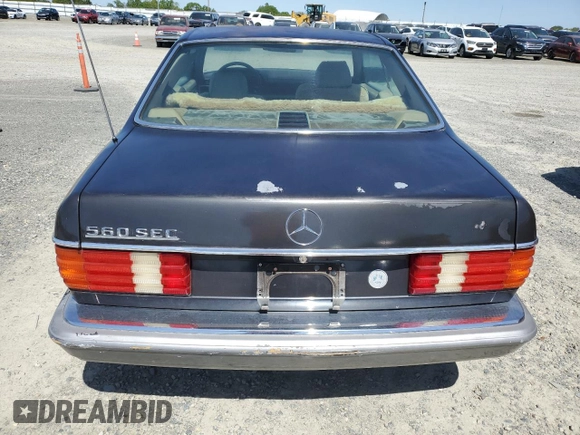 1987 Mercedes-Benz 560 with VIN WDBCA45D3HA358923, listed as a Copart auction lot 52143895 with 127,974 mi miles and Clean Title. Bid and sale history available at DreamBid. Image 6.
