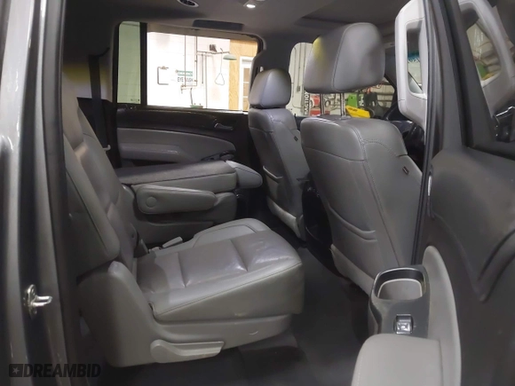 2019 Chevrolet Suburban LT with VIN 1GNSKHKC3KR195042, listed as a IAAI auction lot 41704591 with 107,166 mi miles. Bid and sale history available at carsss.com. Image 8.