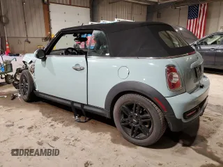 2014 MINI Convertible S с VIN WMWZP3C59ET707581, выставлен на аукционе Copart как лот 46983865 с пробегом 42 746 миль миль и Списание • Salvage title. История ставок и продаж доступна на DreamBid. Изображение 2.