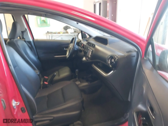 2015 Toyota Prius c One with VIN JTDKDTB3XF1108456, listed as a IAAI auction lot 41743379 with 132,265 mi miles. Bid and sale history available at carsss.com. Image 5.