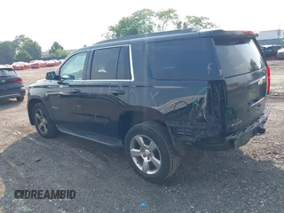 2016 Chevrolet Tahoe LT with VIN 1GNSKBKC4GR288608, listed as a IAAI auction lot 42469898 with 128,364 mi miles and . Bid and sale history available at DreamBid. Image 3.