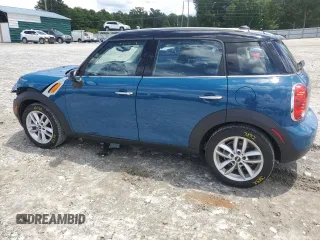 2012 MINI Countryman with VIN WMWZB3C55CWM30373, listed as a Copart auction lot 56836925 with 44,146 mi miles and Salvage title. Bid and sale history available at DreamBid. Image 2.