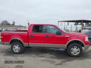 2004 Ford F-150 XLT with VIN 1FTPW14564KC89792, listed as a IAAI auction lot 41658885 with 219,012 mi miles. Bid and sale history available at carsss.com. Image 13.