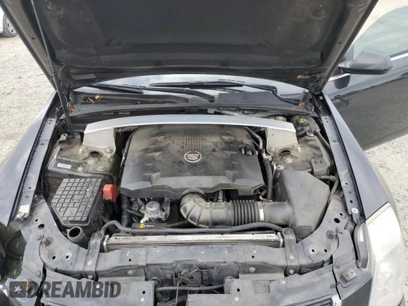 2014 Cadillac CTS with VIN 1G6DA1E39E0104049, listed as a Copart auction lot 56198085 with 121,622 mi miles and Salvage Title. Bid and sale history available at DreamBid. Image 11.